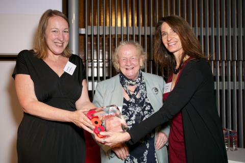 Patricia Smithsen and Bronwyn Ormsby receiving the Award from Baroness Sharp.
