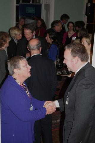 Sue Palmer, Chairman, greeting guest