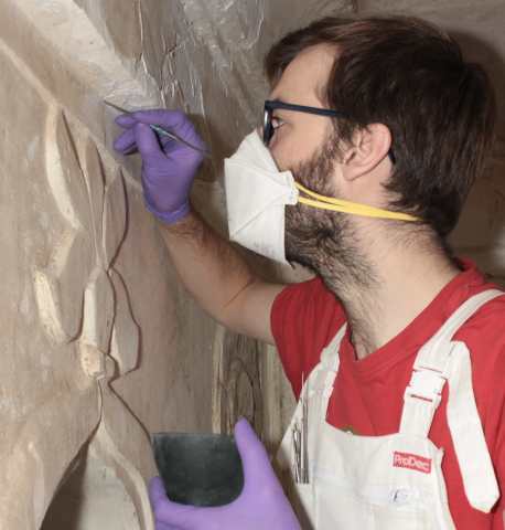 Joshua repairing plaster in the Hadi Rani Mahal, Nagaur Fort, India.