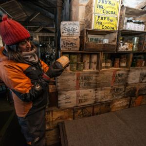 Lizzie Meek in Cape Evans hut. Image by Alasdair Turner.